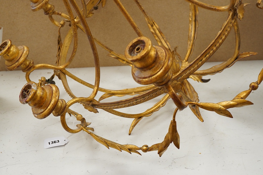 A gilt metal eight light basket chandelier, 86cm